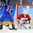 GANGNEUNG, SOUTH KOREA - FEBRUARY 18: Japan's Nana Fujimoto #1 makes a pad save off a shot from Sweden's Lisa Johansson #15 during classification round action at the PyeongChang 2018 Olympic Winter Games. (Photo by Matt Zambonin/HHOF-IIHF Images)

